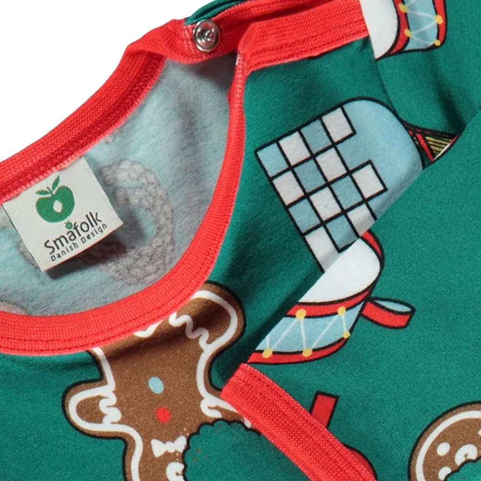 Onesie i Petroleum Green med juldekorationer