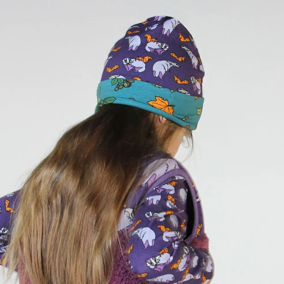 Reversible beanie with badger, fox and Fall leaves Loganberry